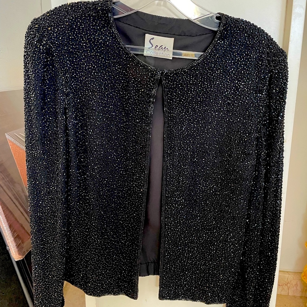 Sequenced jacket. Perfect condition.